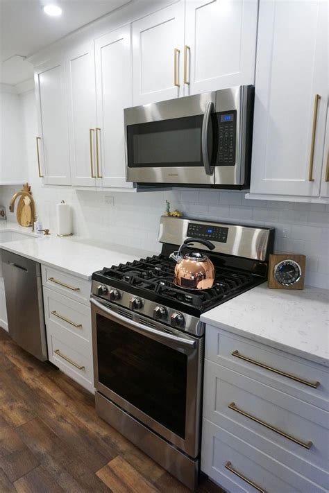 gold cabinet hardware with stainless steel appliances|modern cabinet hardware pulls gold.